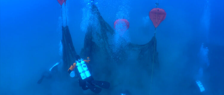 Divers from Ghost Diving Spain lift fishing net weighing 450 KG from reef in Tossa de Mar