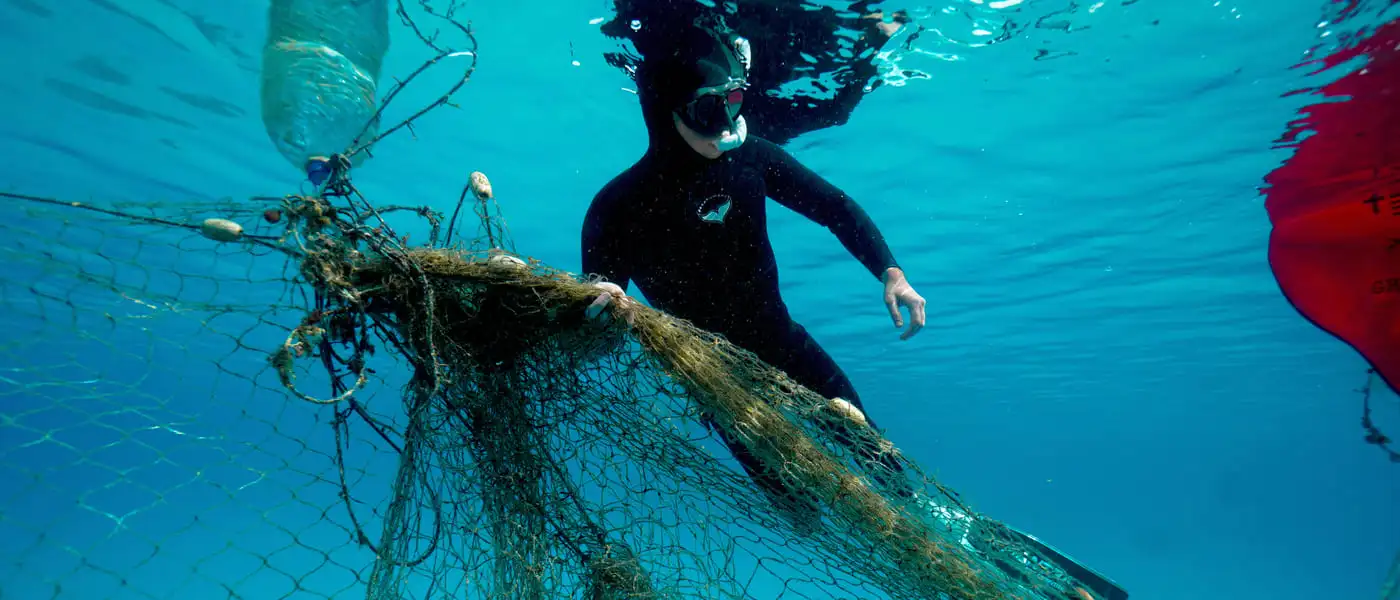 ghost-nets-in-dahab-project-photo-by-Aline-Hobi-compressed Ghost Nets in Dahab towed by a freediver to the shore.